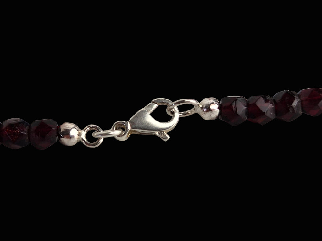 Vintage granaatkleurige glaskralen ketting – 43 cm – met zilveren slot