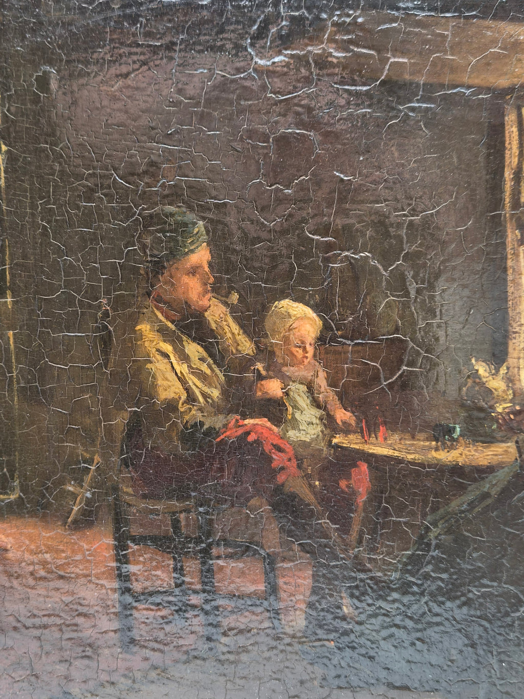Ingelijste schildering met man en vrouw aan tafel, kinderen bij stoel, gebarsten verf