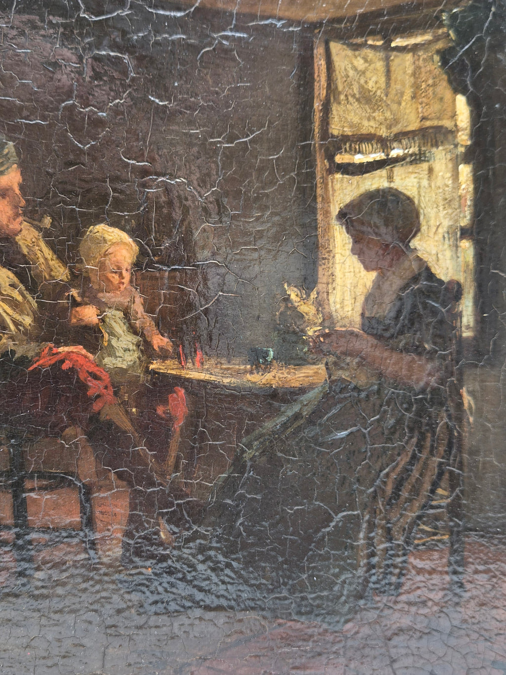 Ingelijste schildering met familie in kamer, personen bij tafel met rode doek