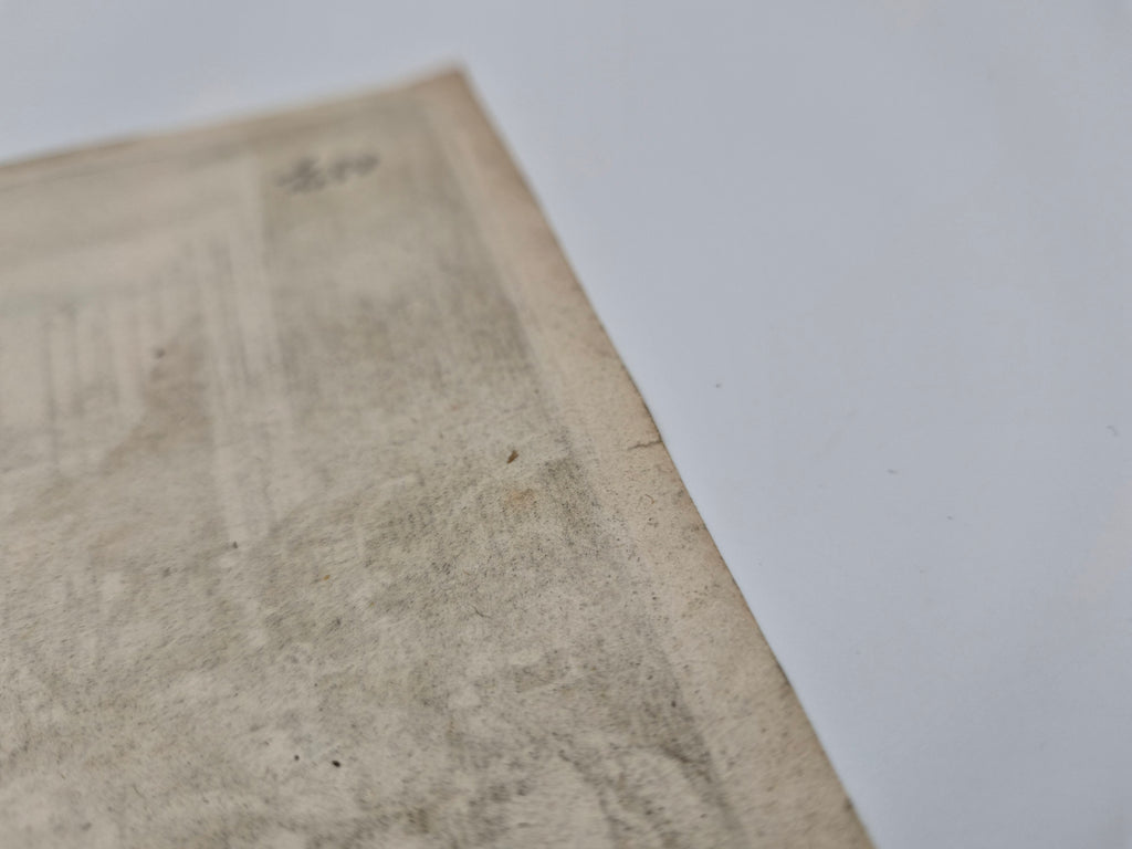 Close-up van ongekleurde gravureprent, vaag bedrukt stadsdeel op papier