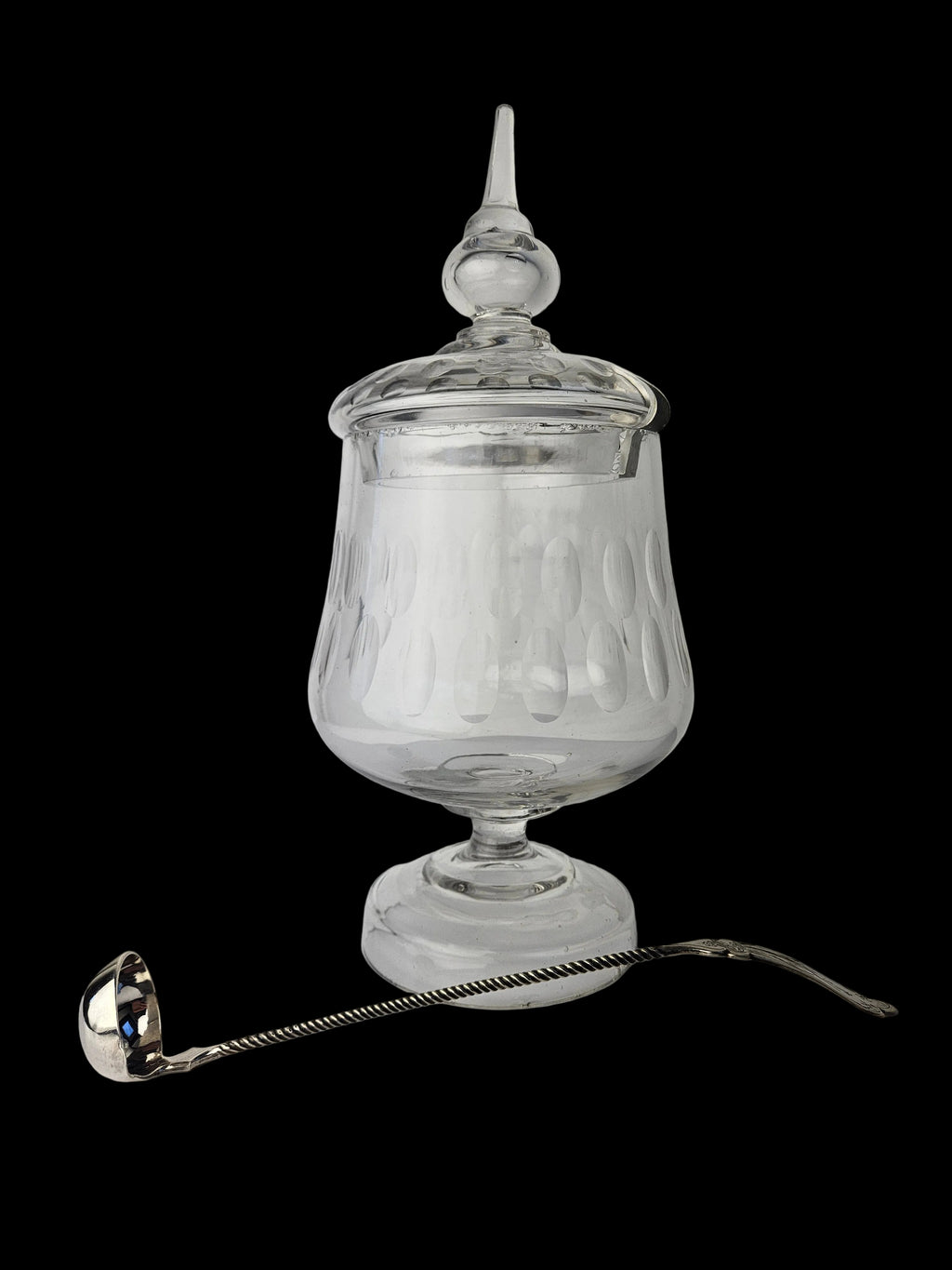 Glazen bowl pot met zilveren lepel